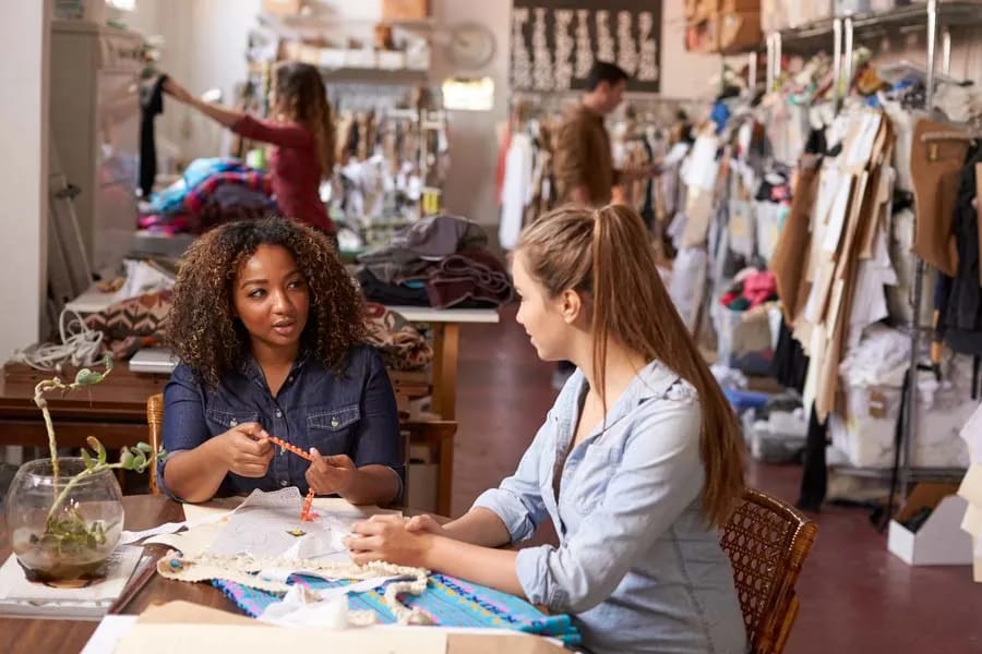 Women in a business workshop planning a new venture
